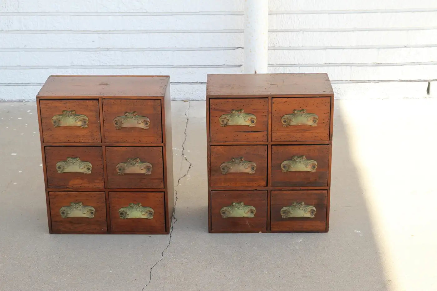 Vintage apothecary drawers featuring iron hardware