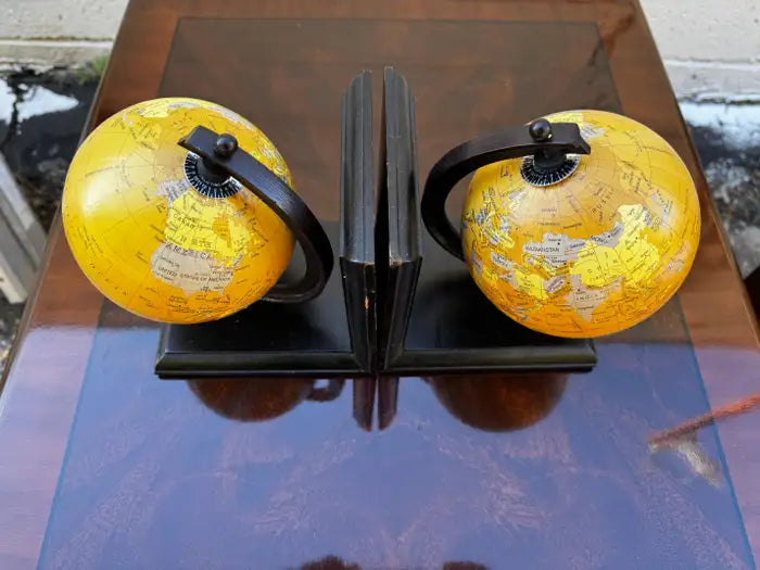 Rotating globe bookends for shelf