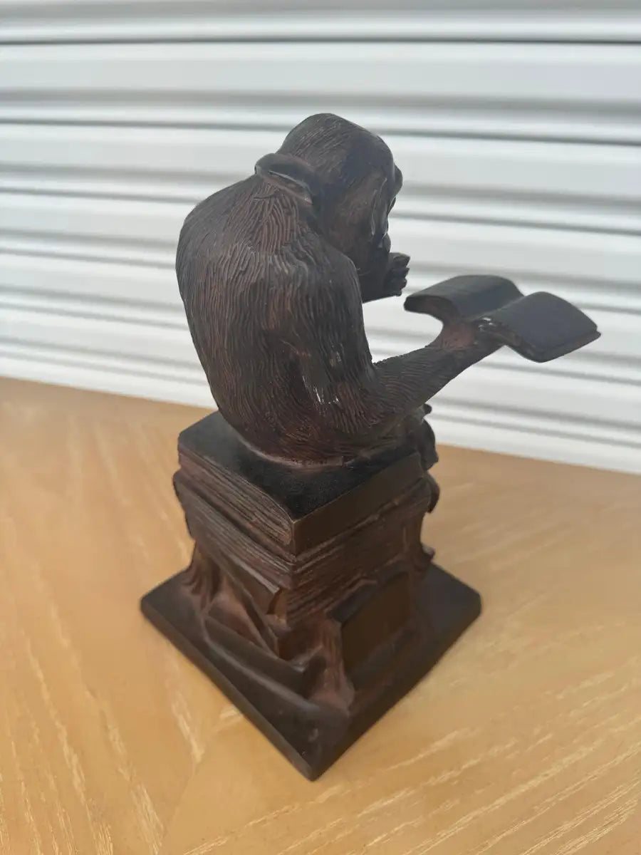 bronze primate sculpture with textured finish