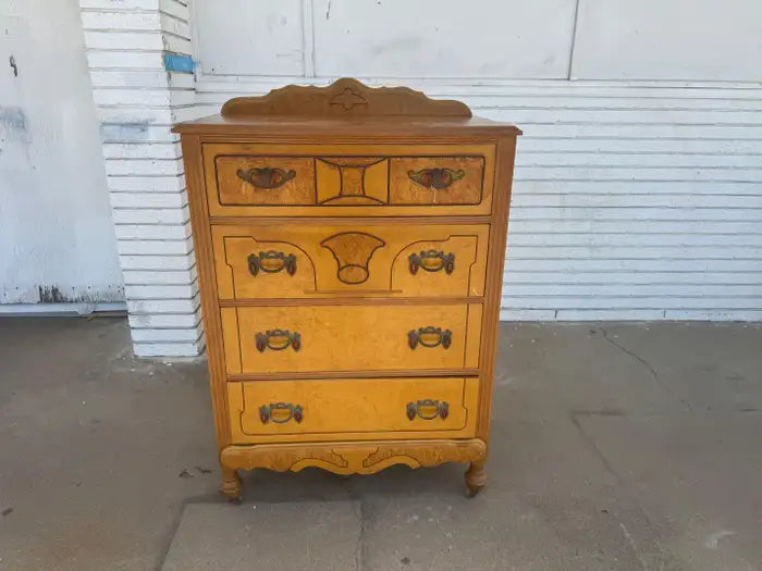 Four-drawer wooden chest with elegant traditional styling