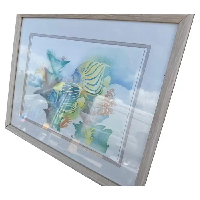 Coastal wall art featuring colorful tropical fish