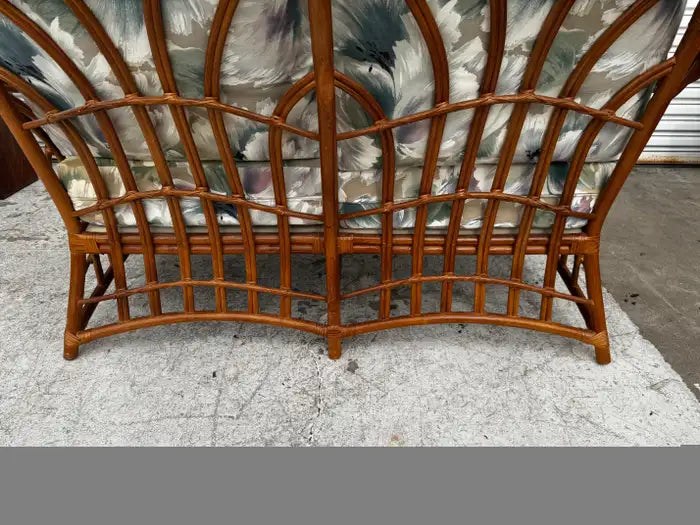 Coastal inspired rattan loveseat home decor