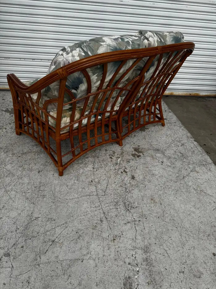 Coastal rattan loveseat featuring natural texture