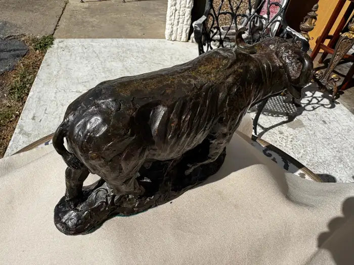 Sculpted bronze bull with patina detail