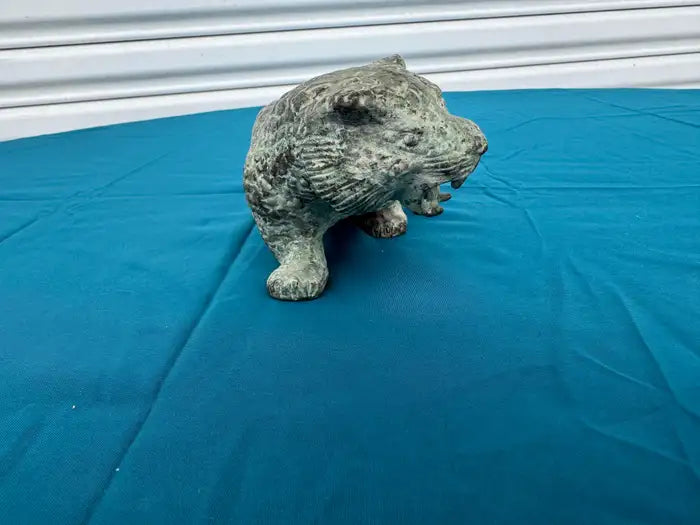collectible bronze leopard statue with textured surface