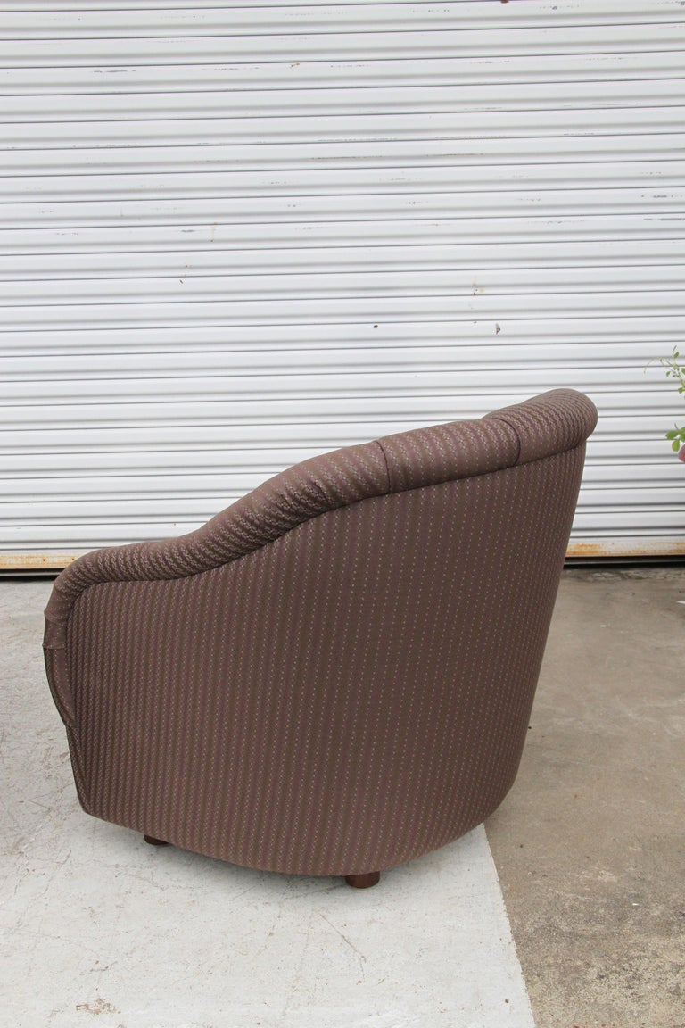 Plush barrel back tufted lounge seat