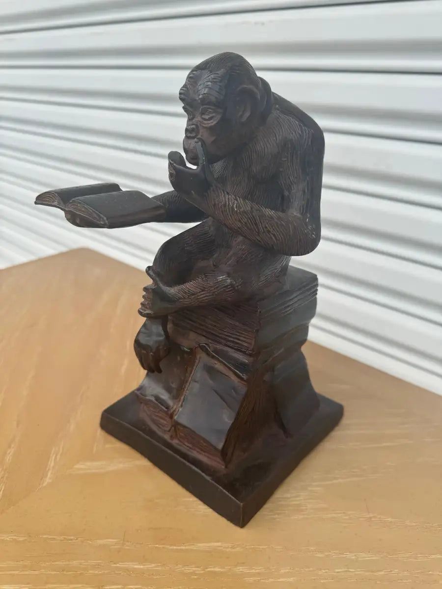 monkey statue inspired by thinker style bronze art