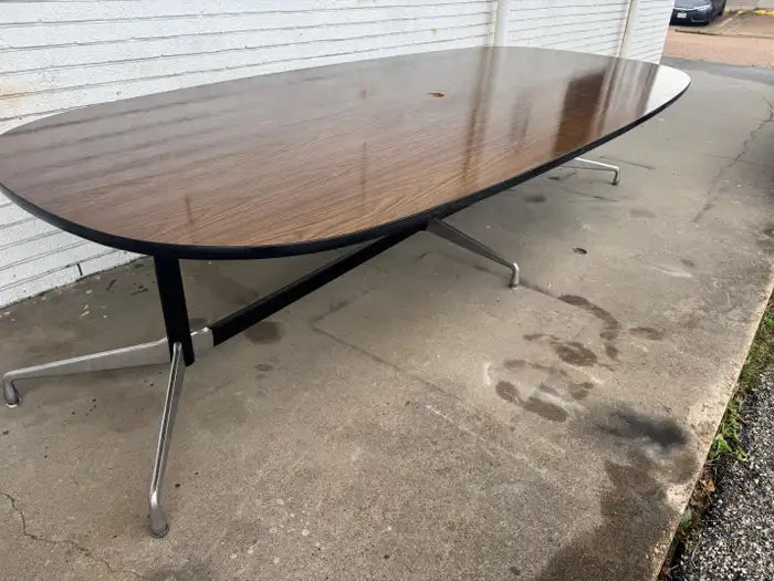 Designer conference room table with sleek architectural silhouette