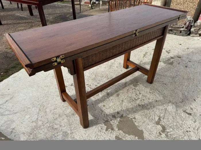 Flip top writing desk with cane panel drawers