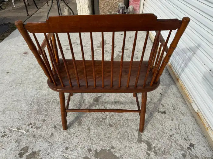 Country cottage wooden bench with curved arms