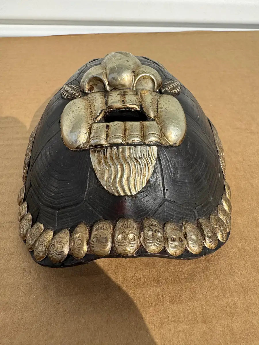 handcrafted wall mask with antique style metal accents