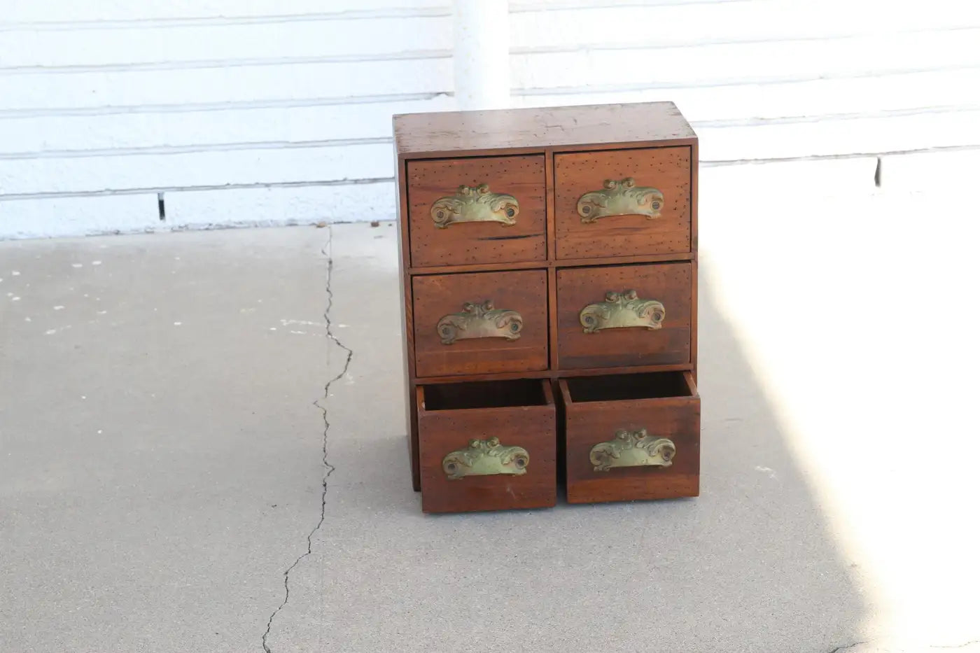 Classic pharmacy apothecary chest with decorative hardware