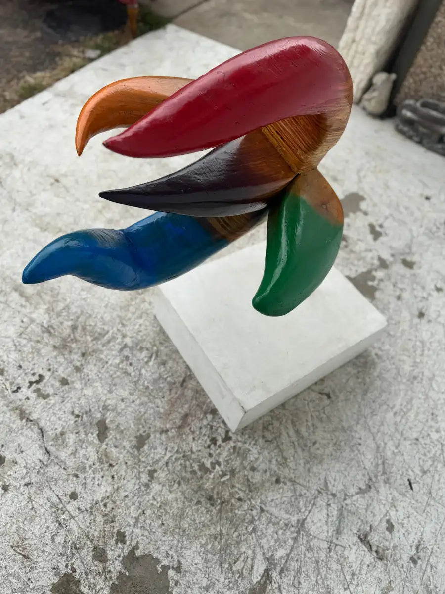 mid century carved wood sculpture with natural tones