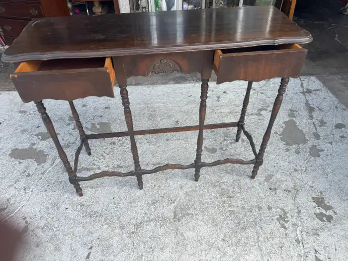 Vintage entryway furniture with ornate carved wood details