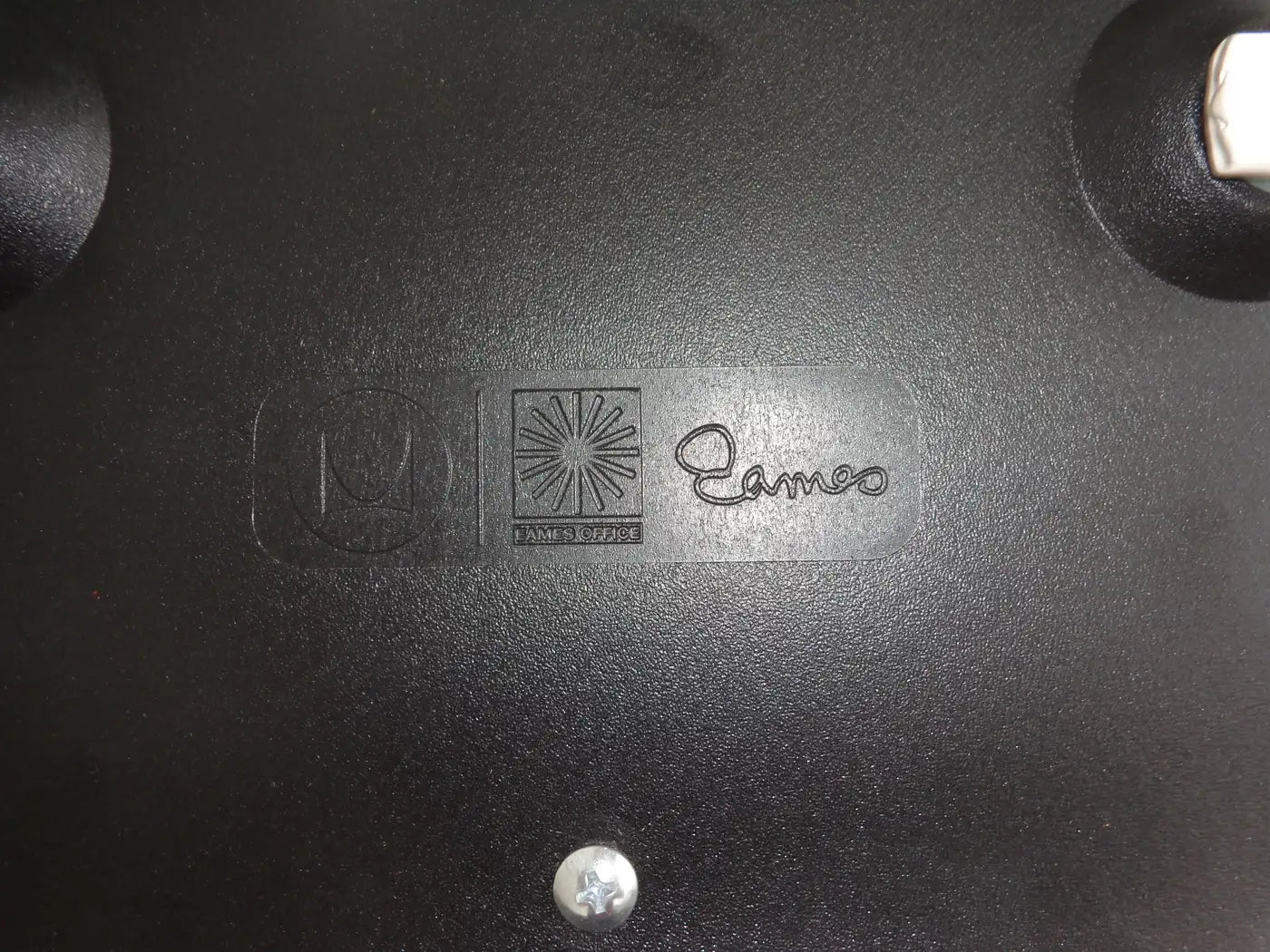 Black molded side chairs Herman Miller