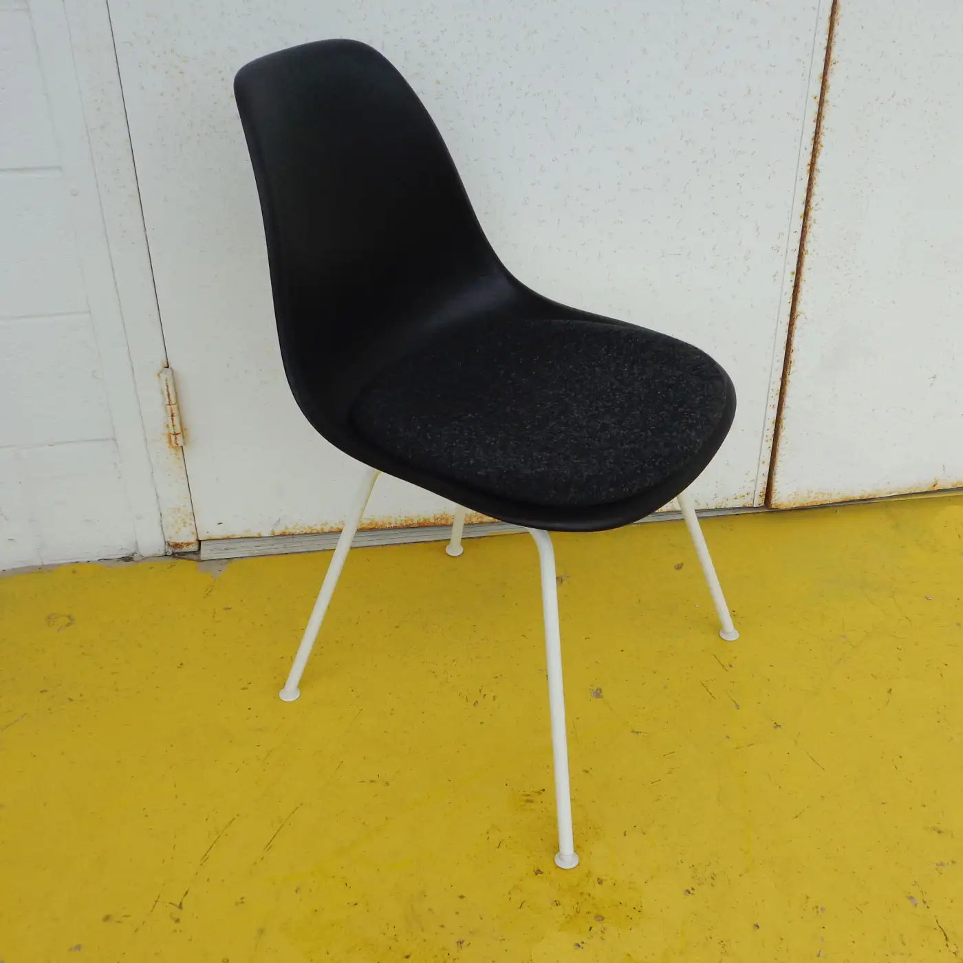 Eames side chairs with chrome legs