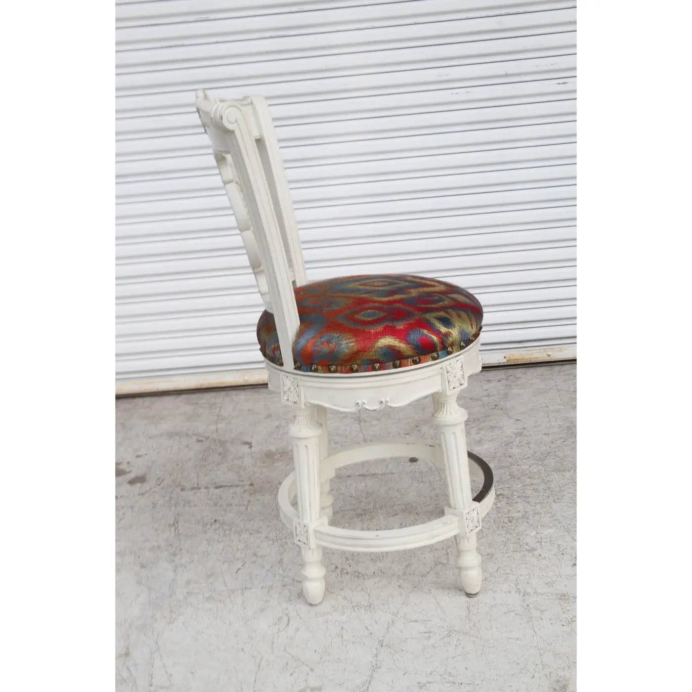 Rustic white frame bar stool with ornate seat