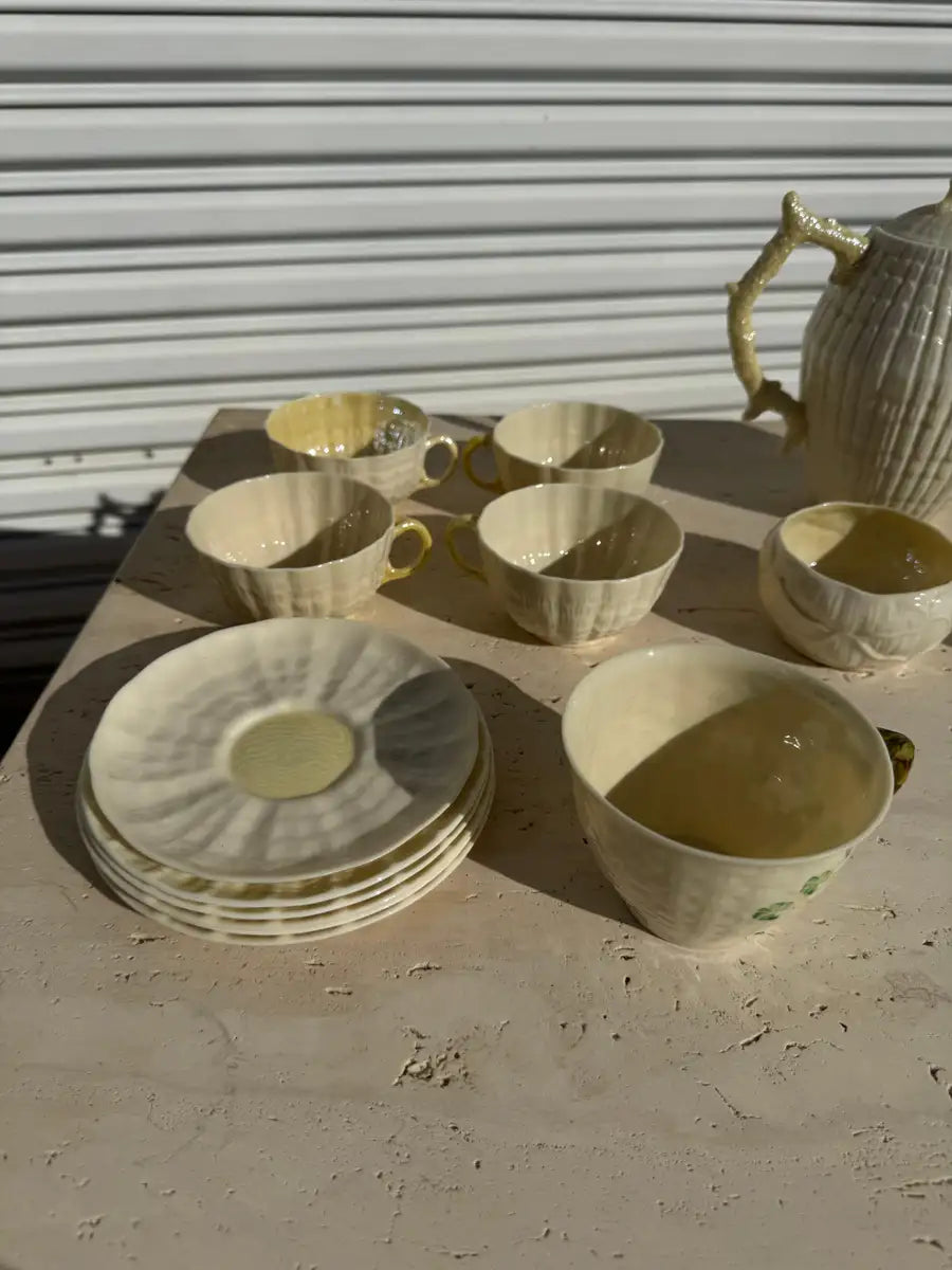 Vintage collectible tea set with scalloped edges and fine glaze