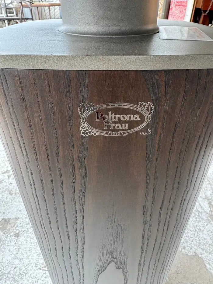 Architectural walnut dining table base detail