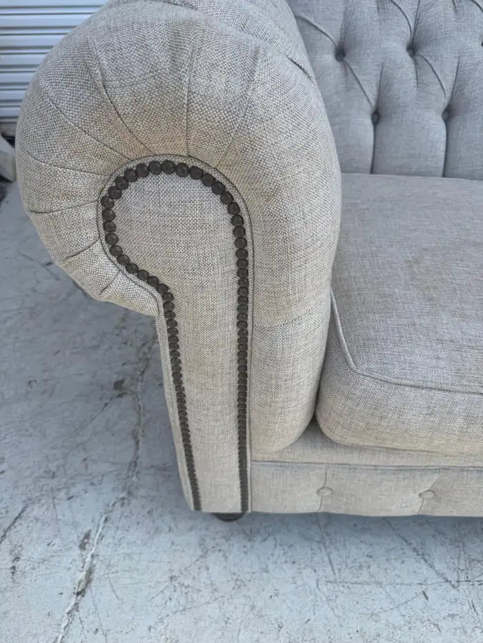 Classic tufted Chesterfield loveseat for traditional living rooms