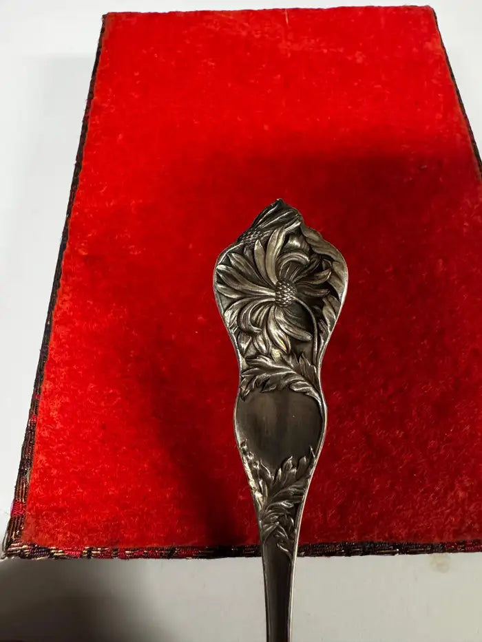 Engraved silver spoon craftsmanship