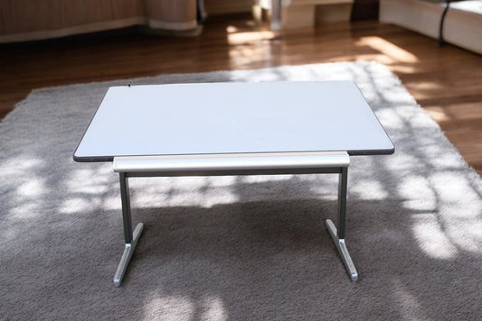 Ergonomic adjustable drafting table with metal frame and white top