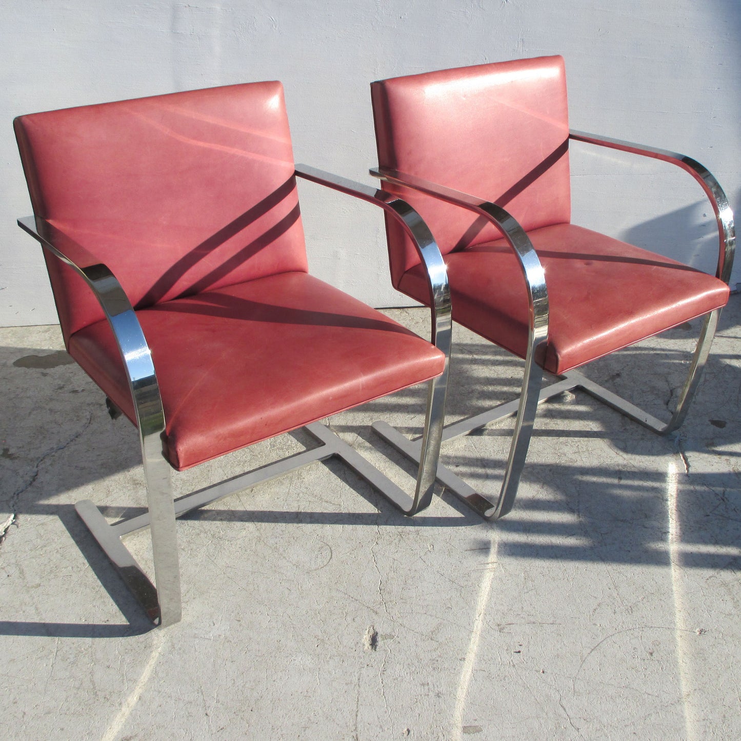 Red leather Brno flat bar armchairs vintage