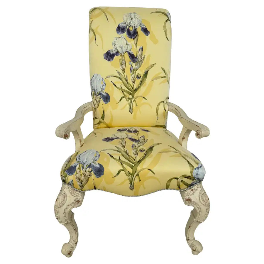 French carved wood armchair with upholstered scroll back design