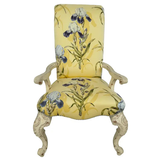 French carved wood armchair with upholstered scroll back design