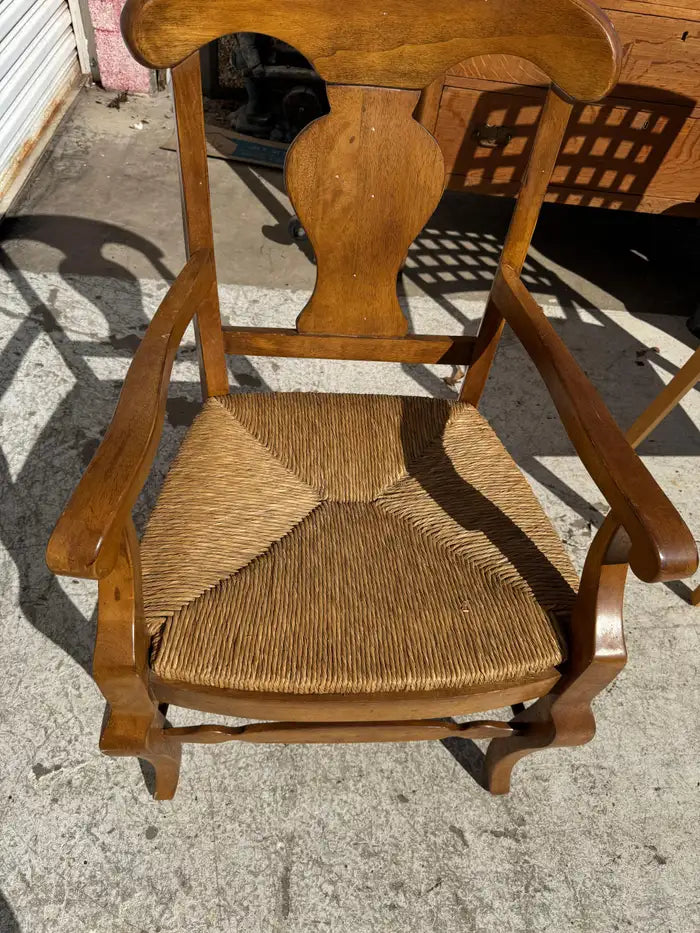 rustic walnut armchair woven seat design