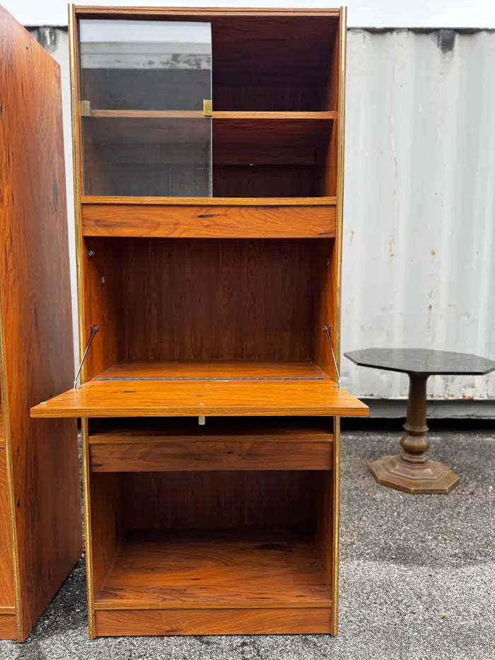 Walnut glass bookcase with integrated lighting