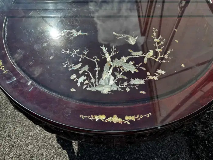 Vintage dining table close up mother of pearl inlay detail