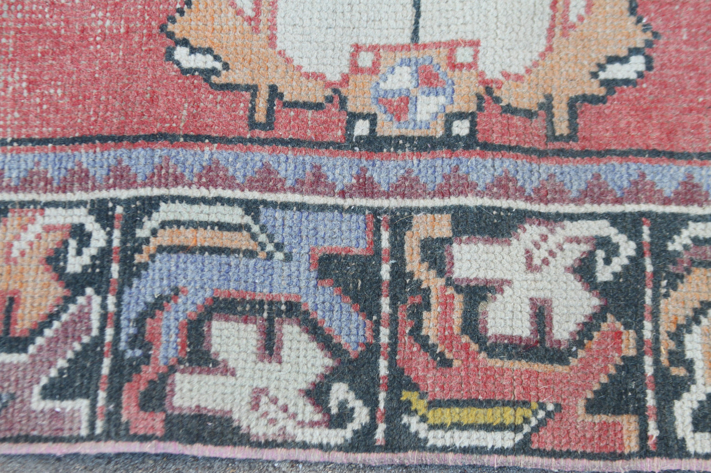 Pastel pink vintage rug for entryway design