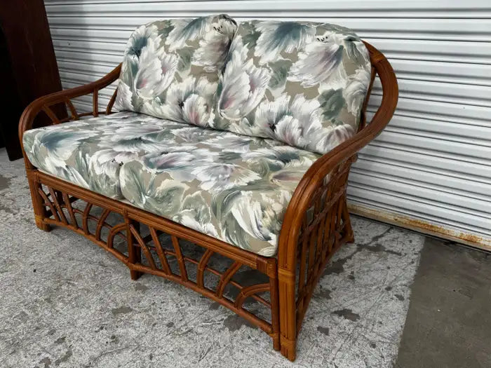 Natural rattan loveseat with soft seat cushions