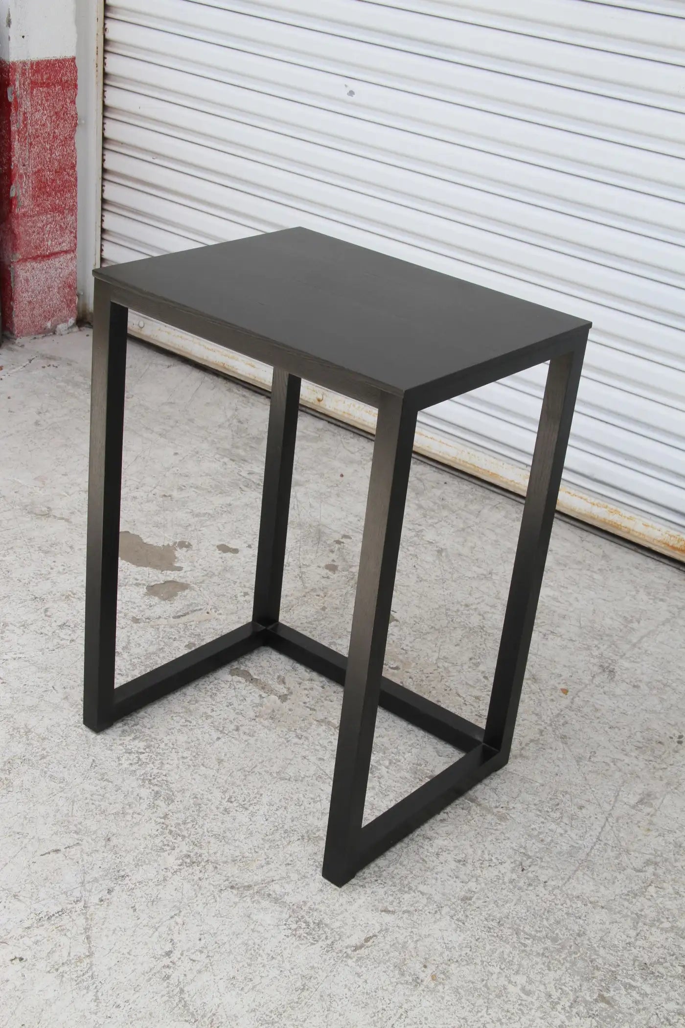 Elegant Art Deco nesting tables in black wood