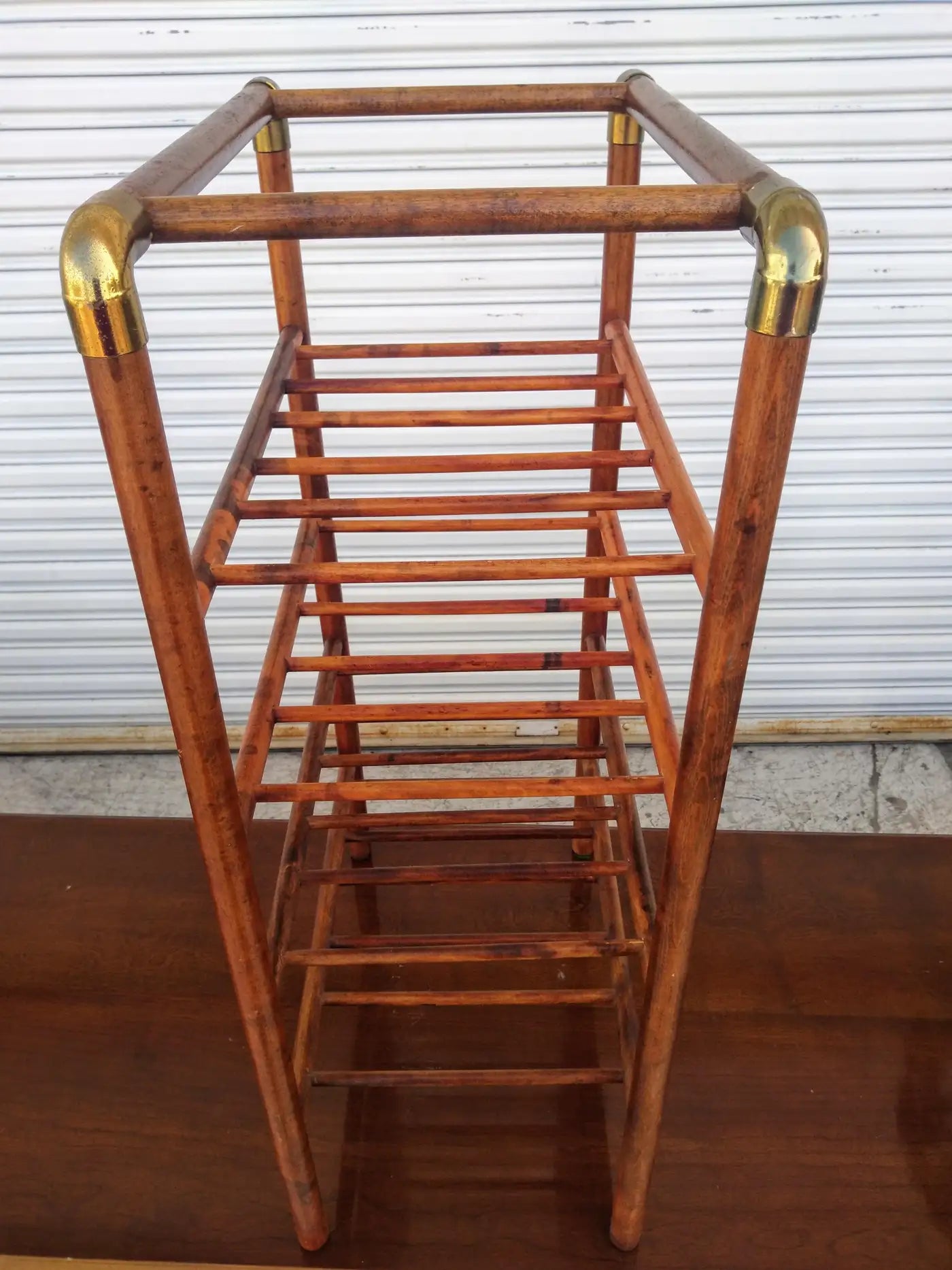 Decorative wine rack with brass details
