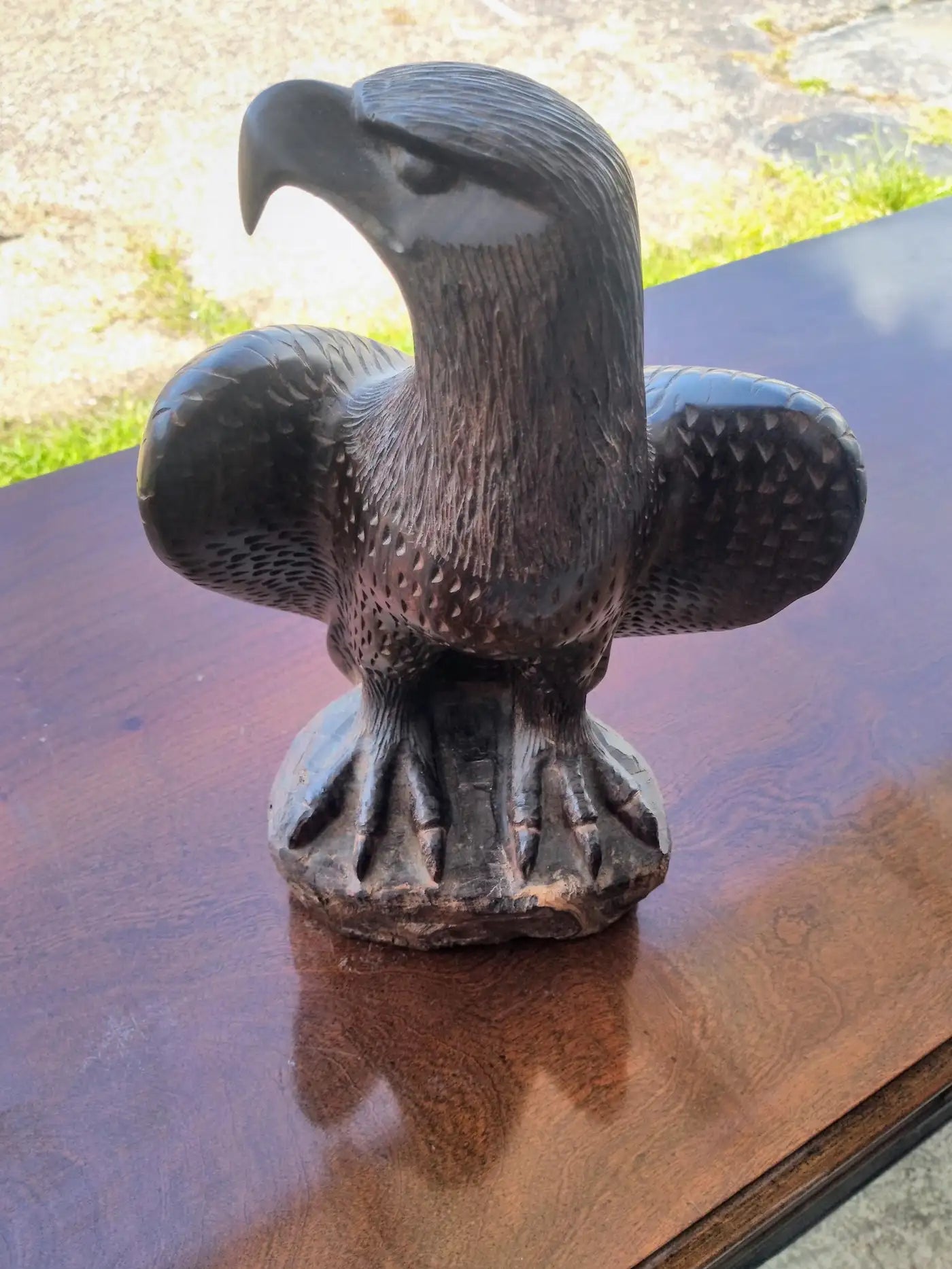 Handcrafted wooden eagle statue