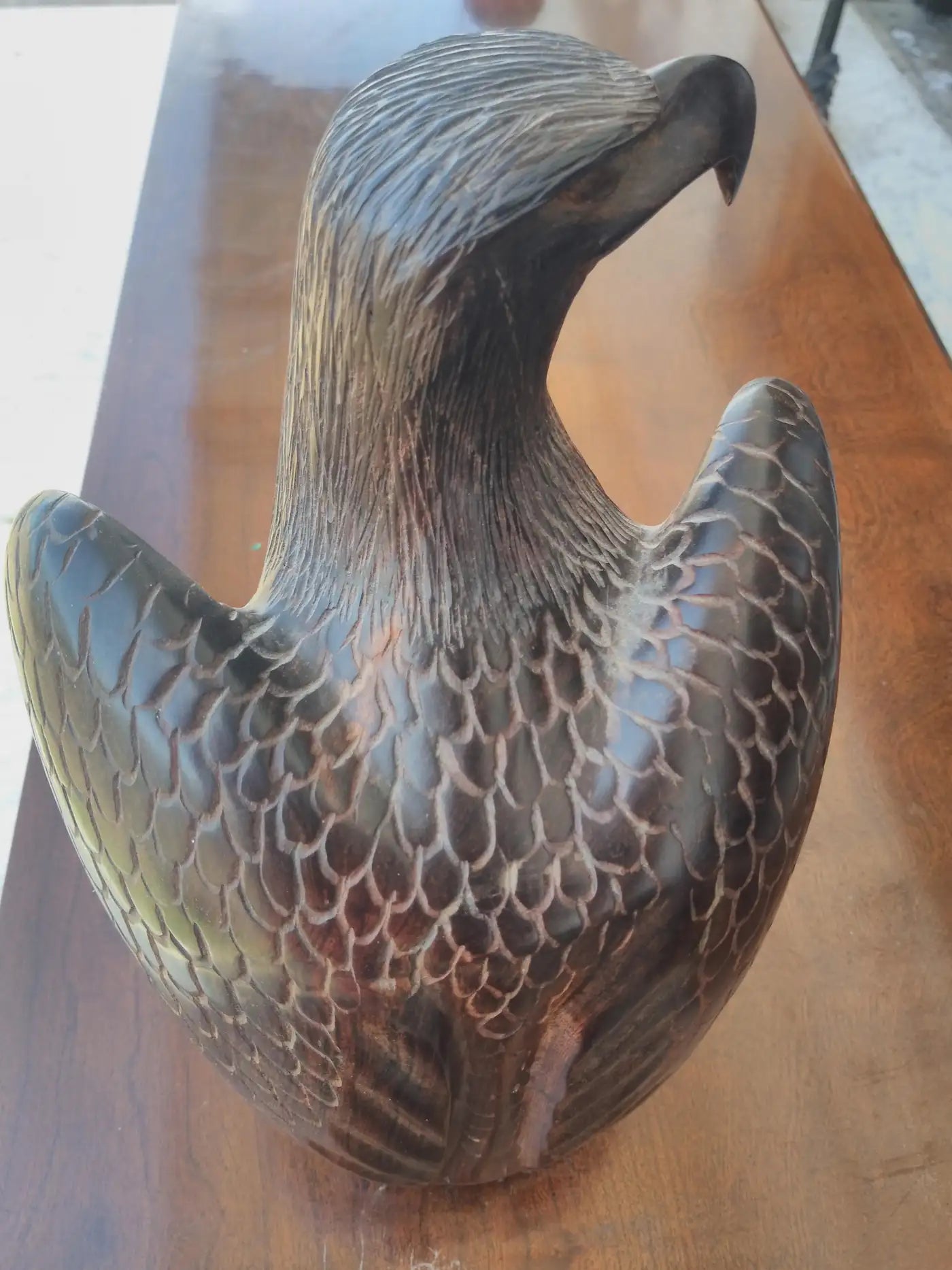 Detailed eagle sculpture in wood