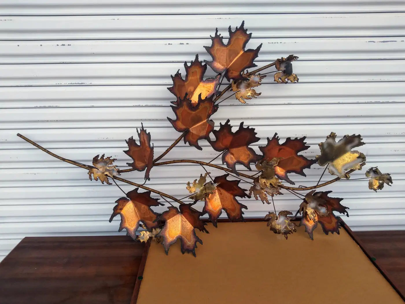 Mid-century metal wall art by Curtis Jere