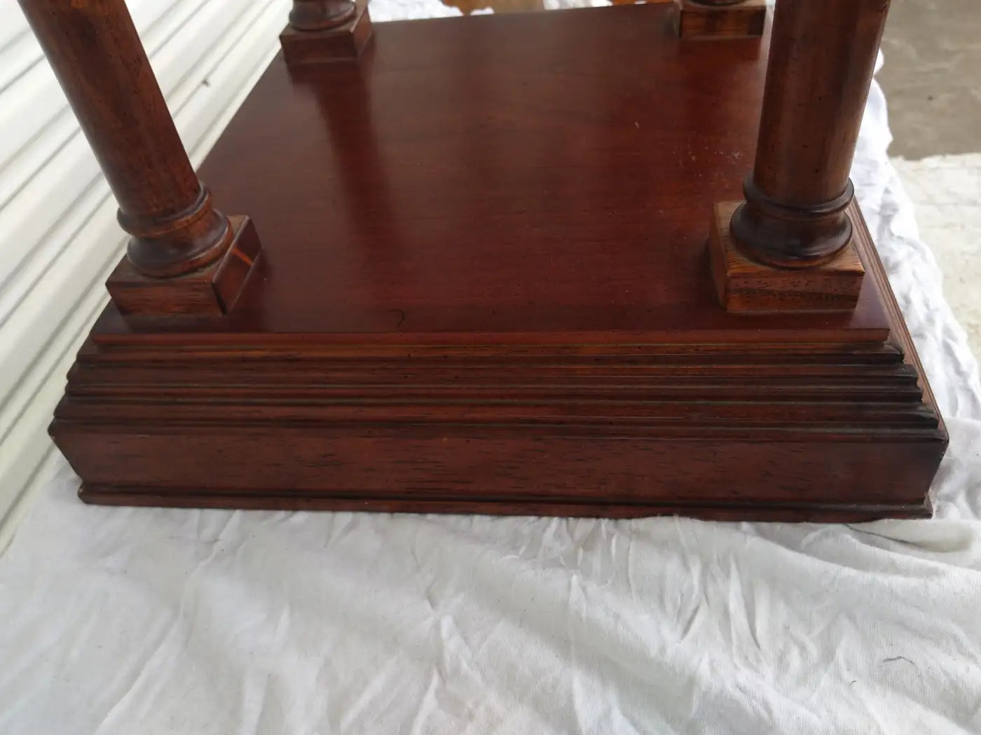 Antique-style square pedestal in Neoclassical design