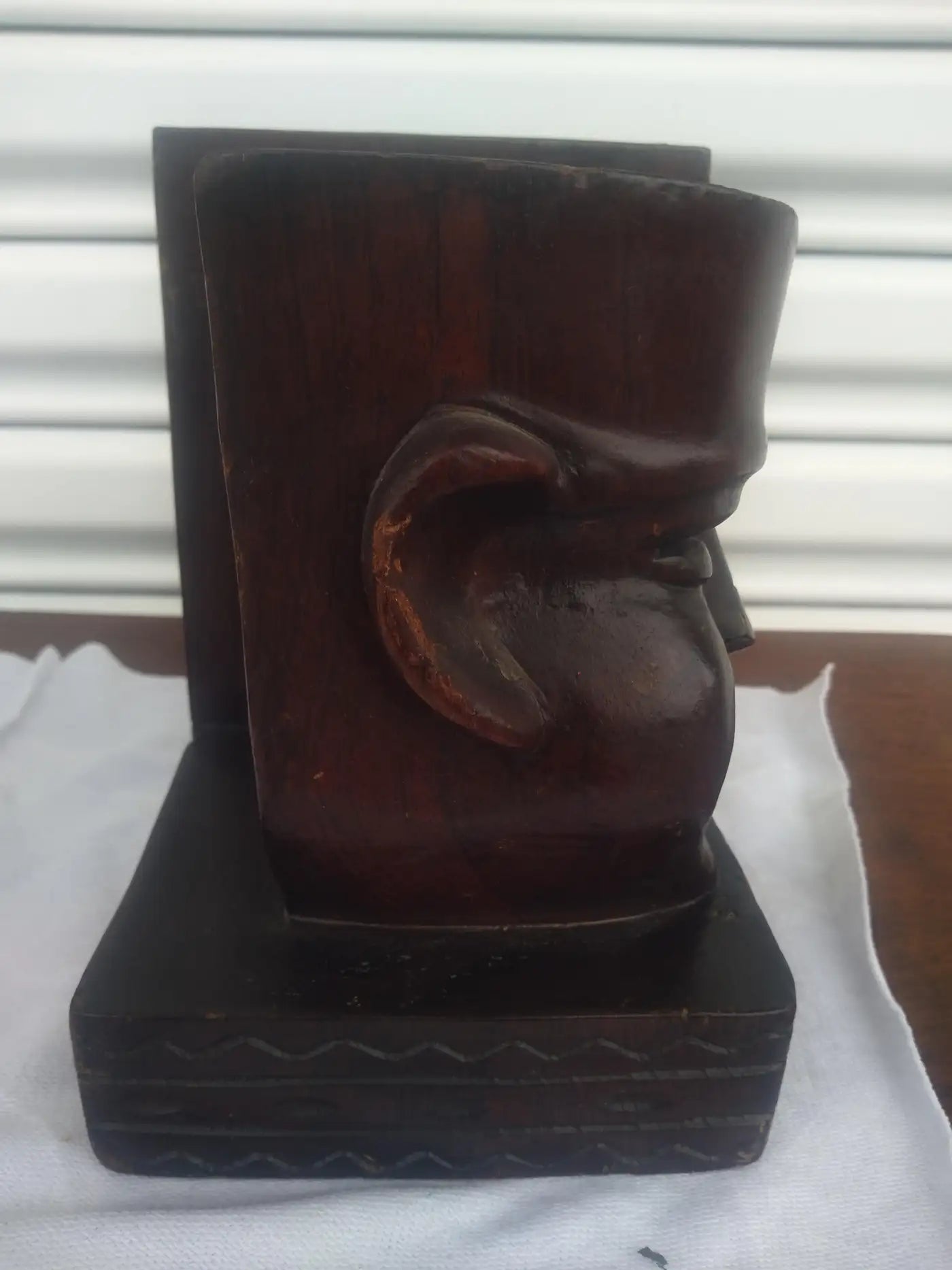 Vintage carved bookends with theatrical masks