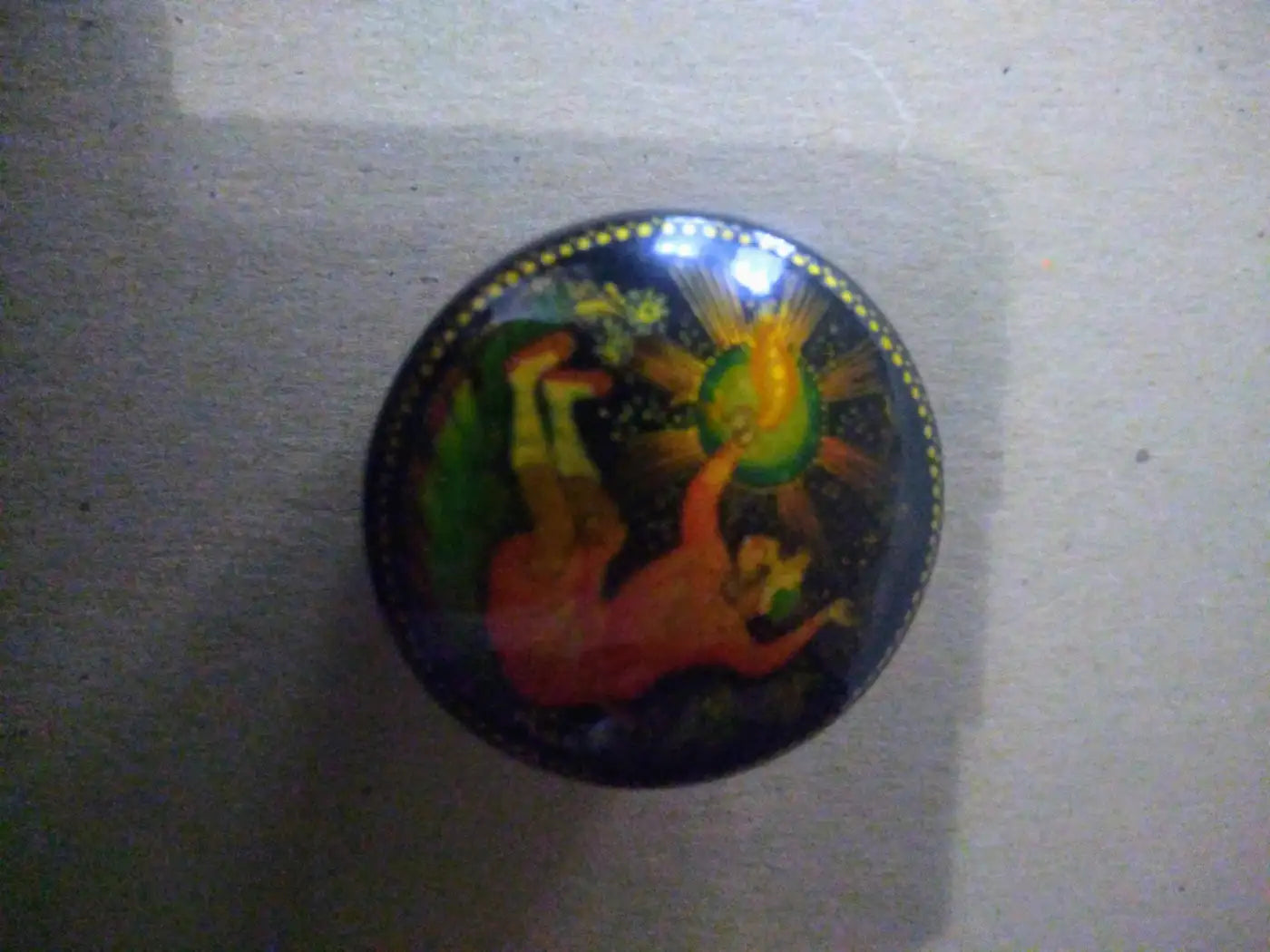 Hand-painted Russian lacquered box featuring floral design