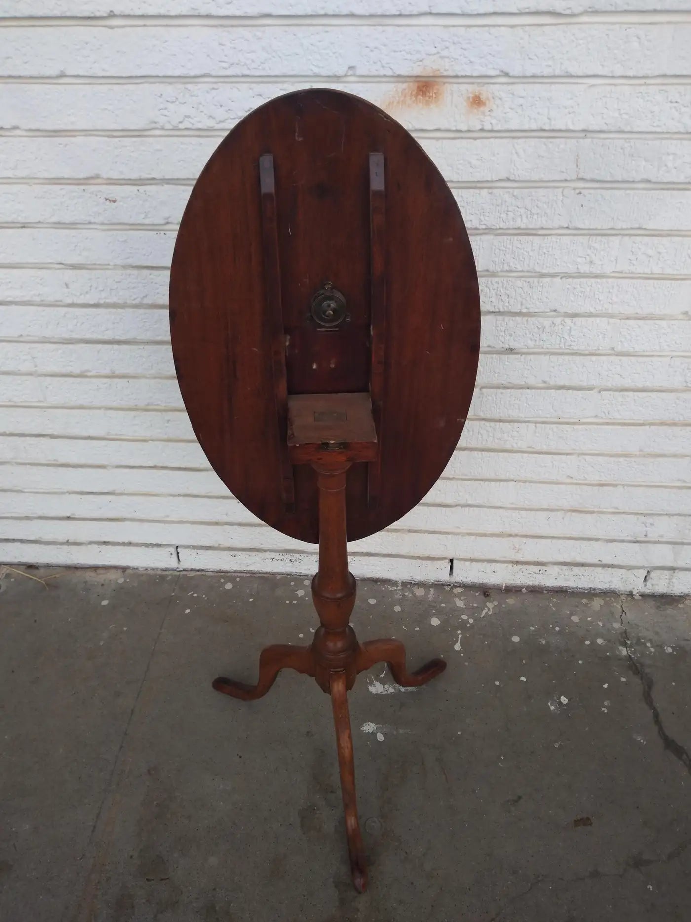 Vintage tilt top table with elegant base