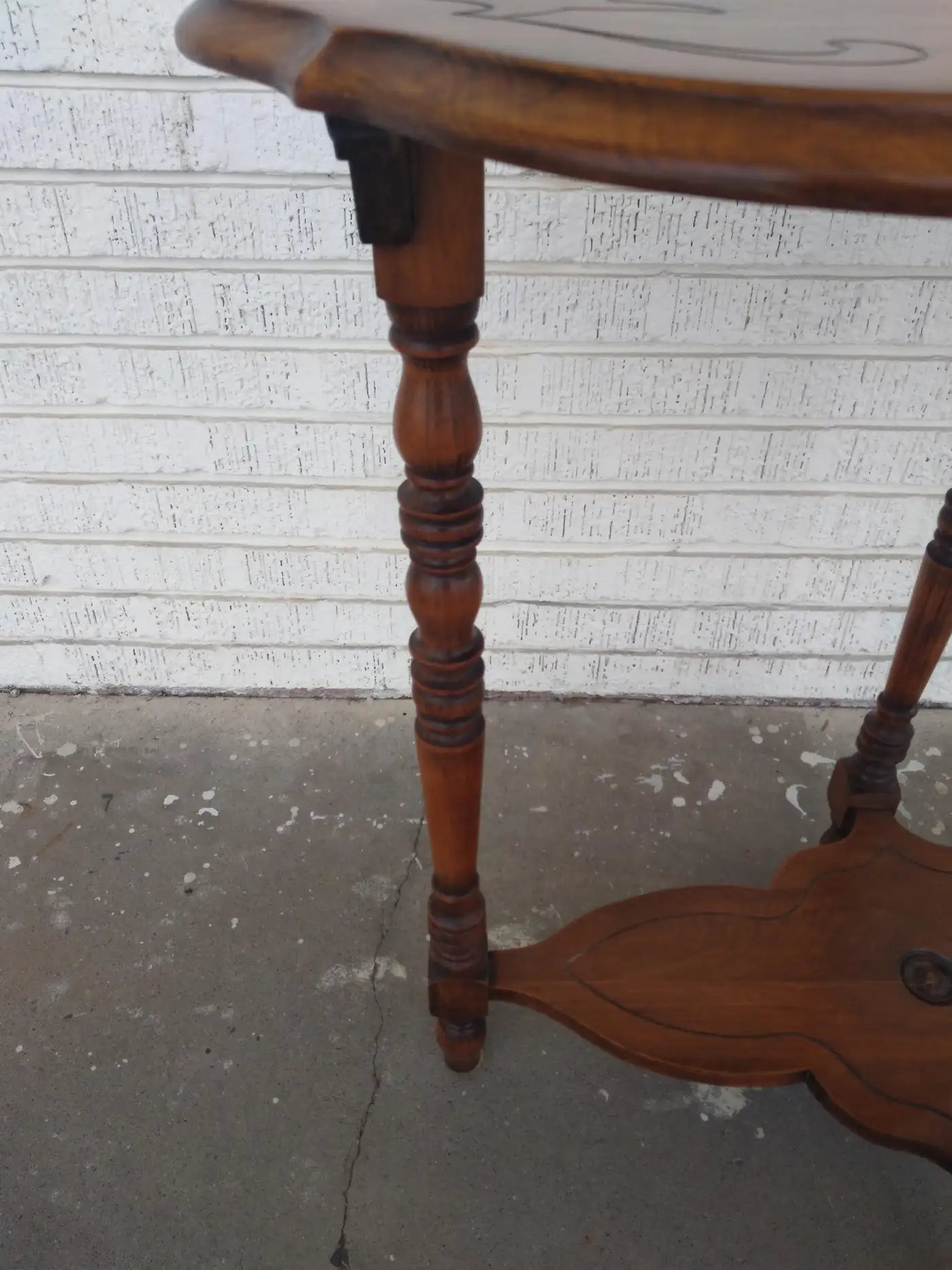 Handcrafted Edwardian walnut side table with intricate carvings