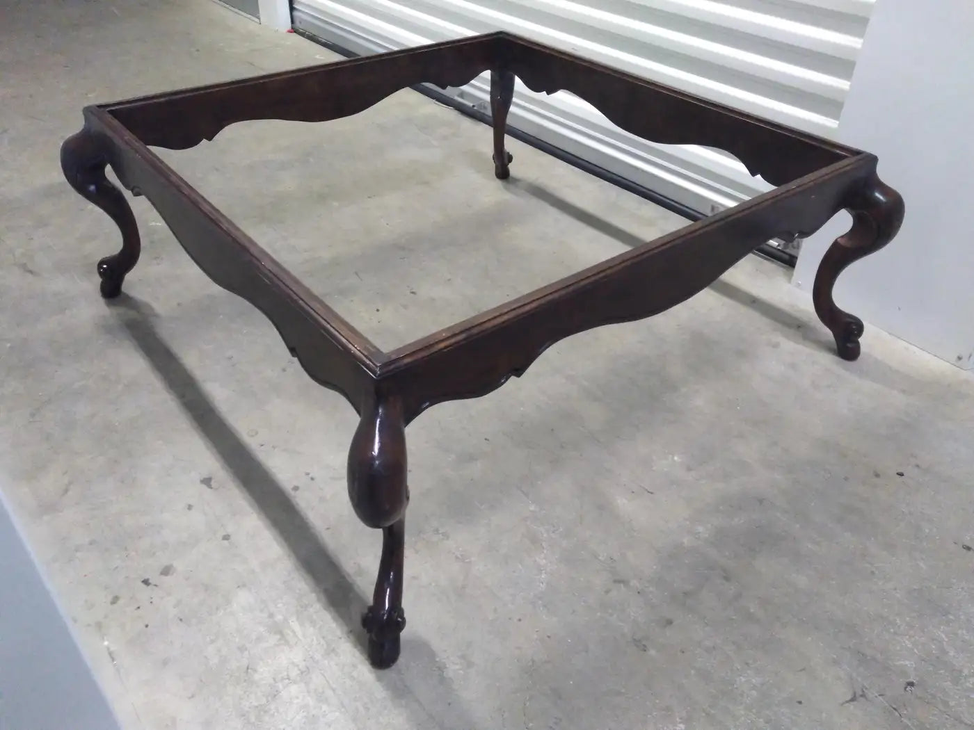 Decorative walnut coffee table with glass top