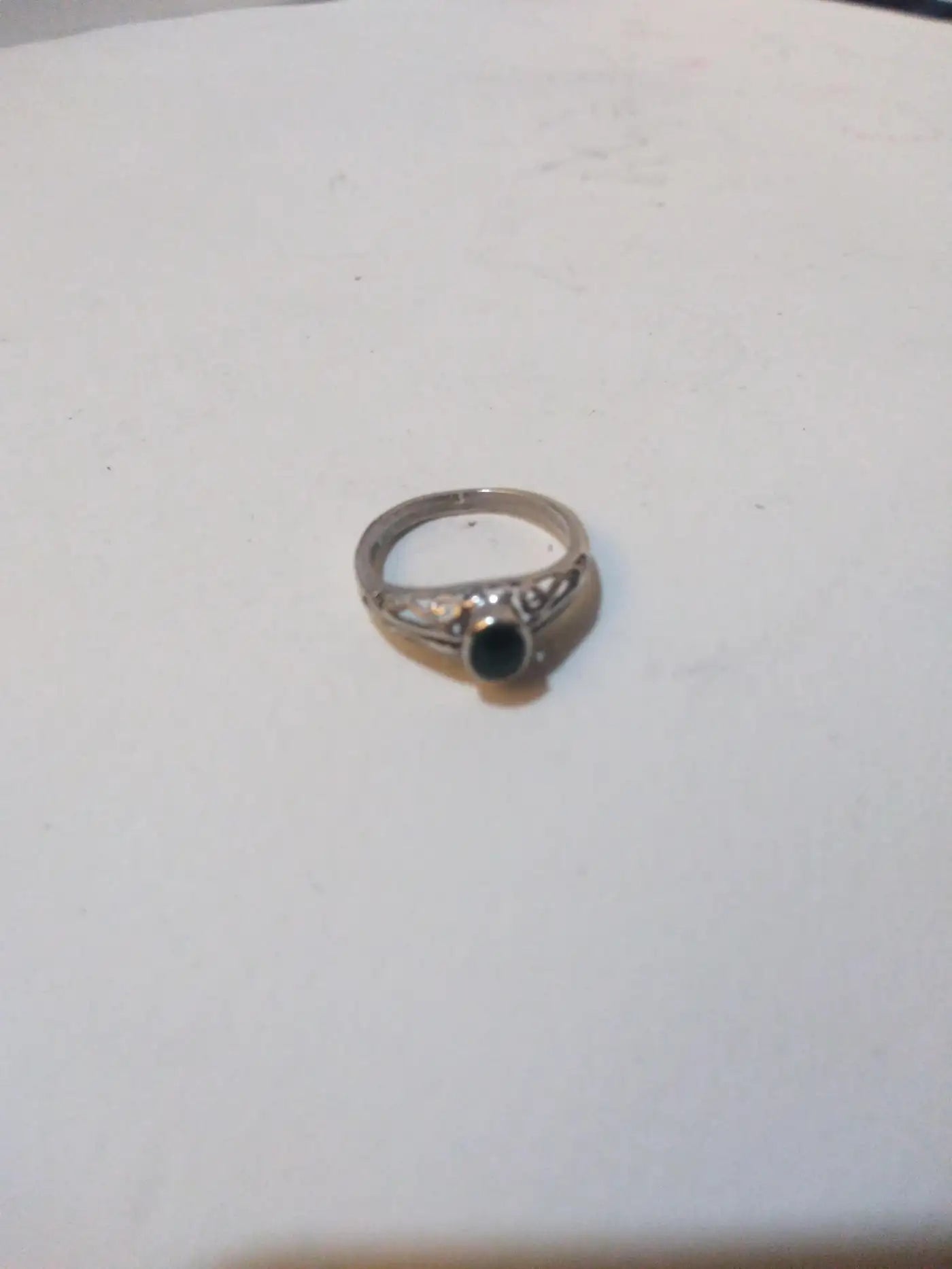 Green druzy gemstone ring in silver setting
