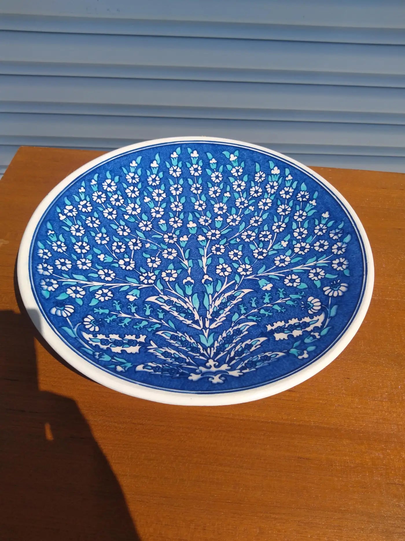 Hand-painted Turkish Iznik plate with floral design
