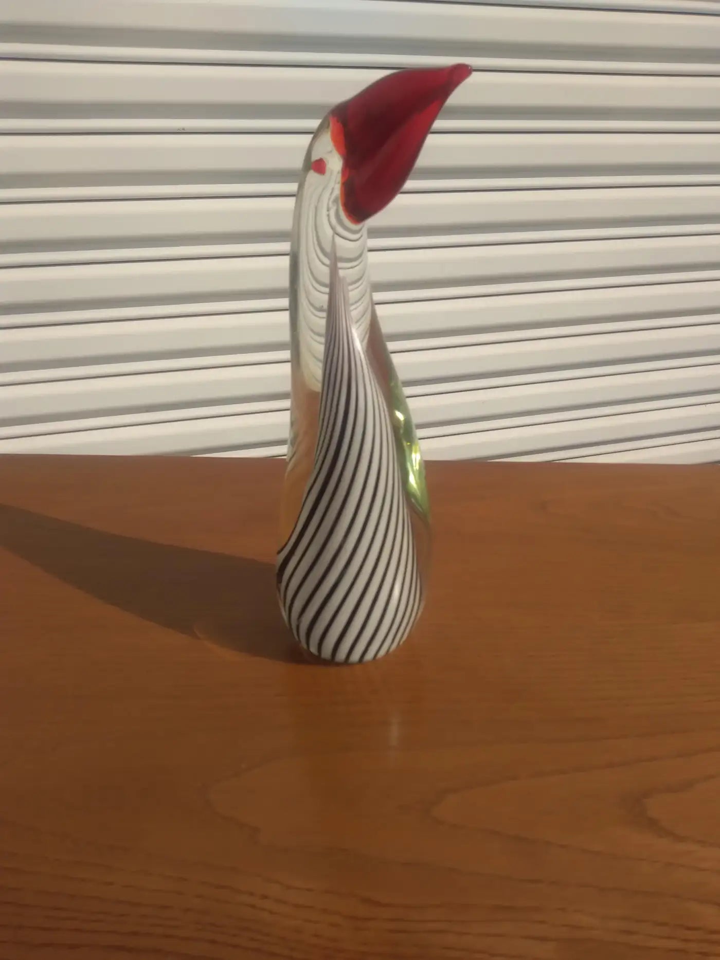 Artistic handblown parrot sculpture for decor