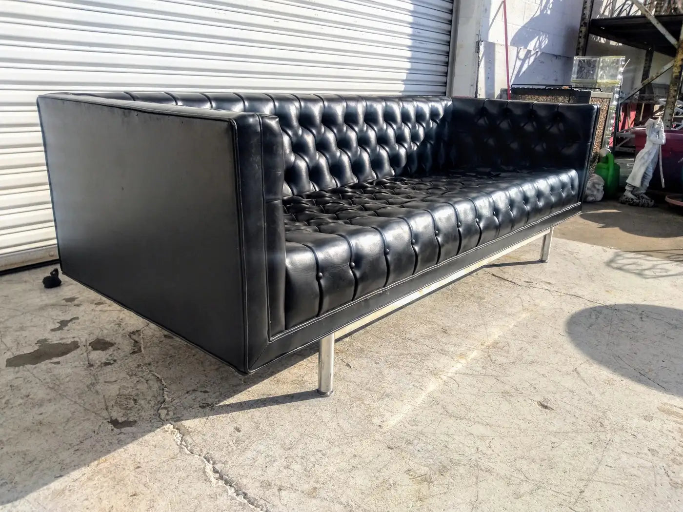 Mid century modern black leather-look sofa