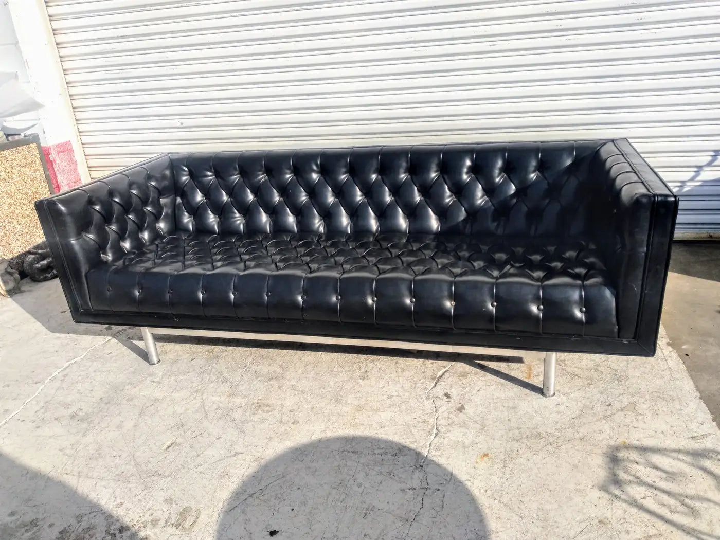 Stylish tufted sofa by Jack Cartwright